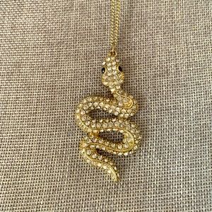 Silver tone and crystal long snake necklace